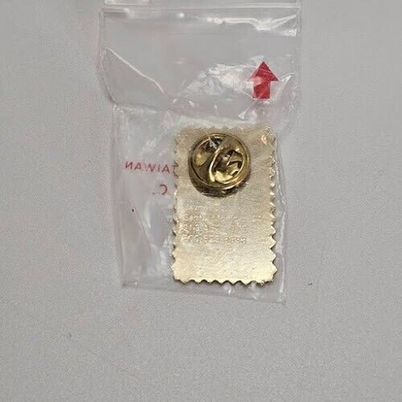 "Learning never ends" USA 15c Stamp Lapel Pin Commemorative 1.25 in X .5 in - Picture 2 of 6